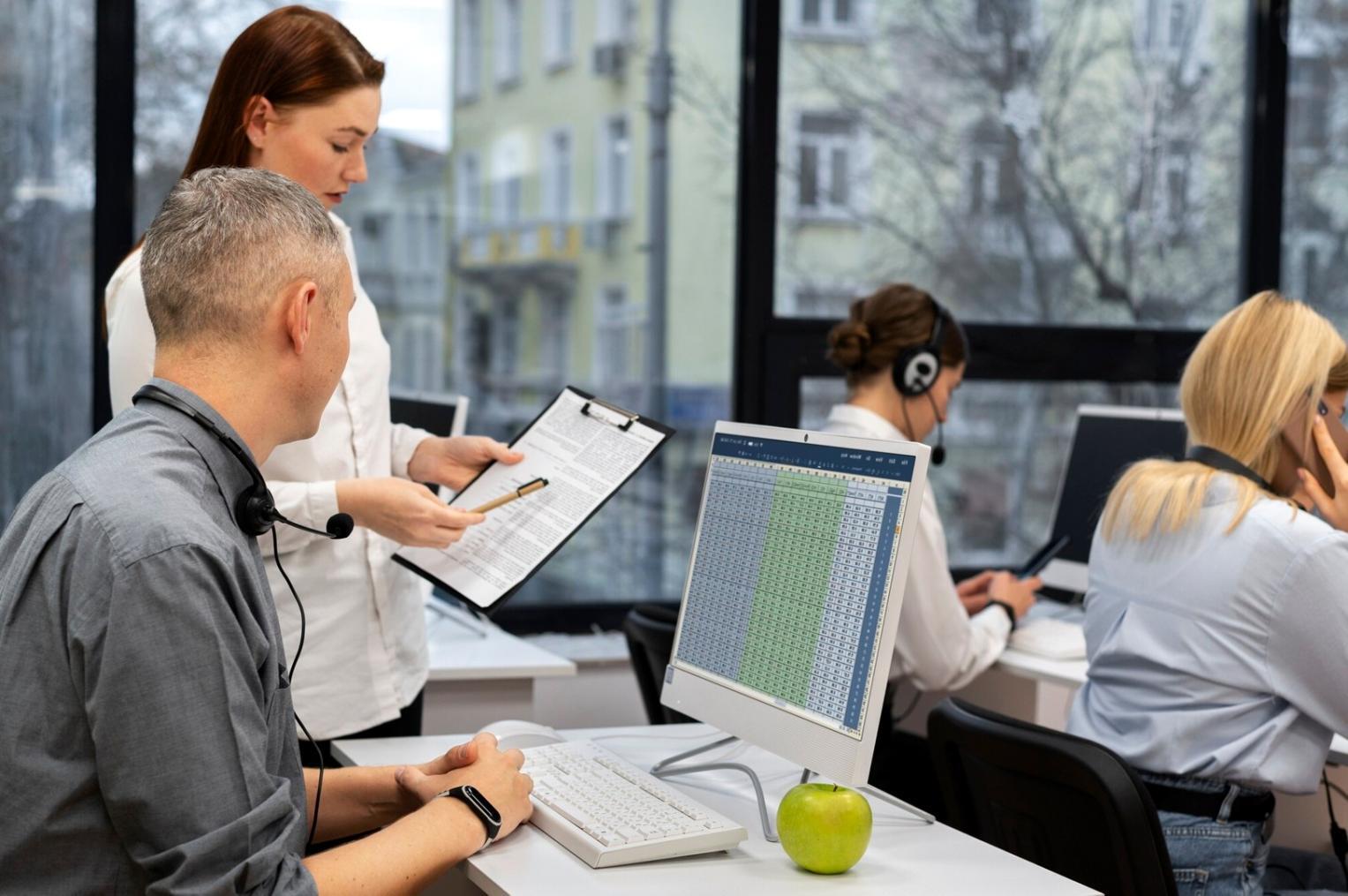 Professional financial planning consultation showing documents and charts